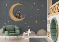 Modern kids space with a green armchair and a bear on the moon wall mural