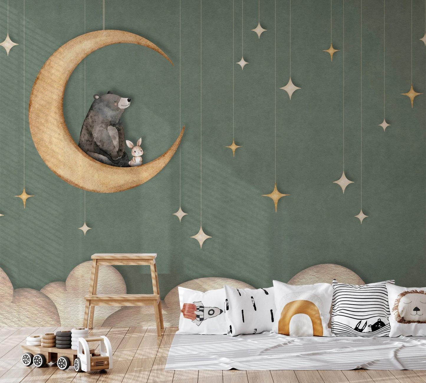 Bear on The Moon Green Wall Mural behind a wooden stool and floor cushions.