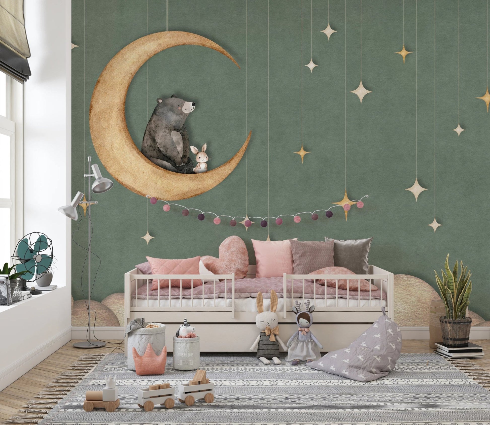 Minimalist kids space with a moon and stars wall mural and floor rug.