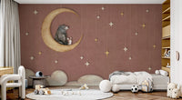 Large kids bedroom with a study desk and celestial bear wall mural.