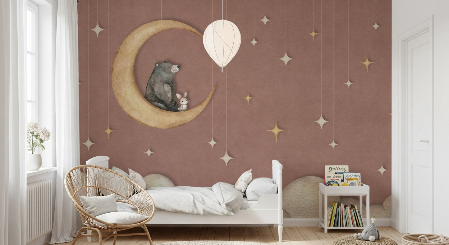 Minimalist nursery with a white cot and red moon theme wall mural.