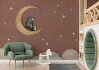 Reading nook with a green armchair and Bear on The Moon Red Wall Mural.