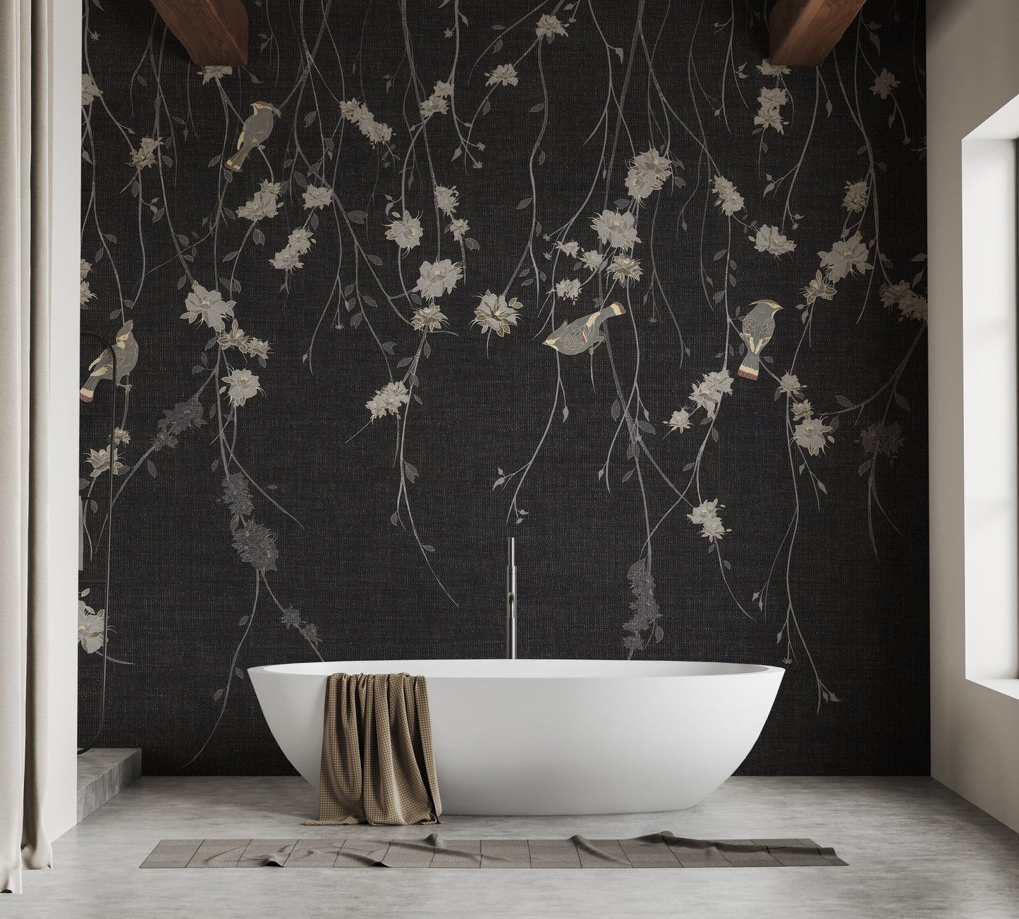 Bathroom wall mural featuring black floral design behind a white pedestal tub.