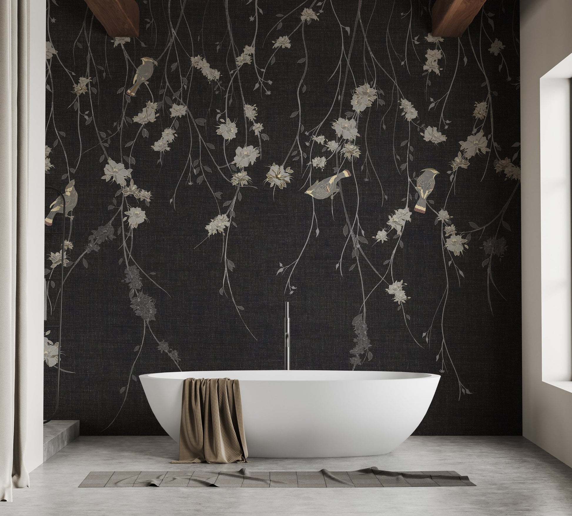 Bathroom wall mural featuring black floral design behind a white pedestal tub.