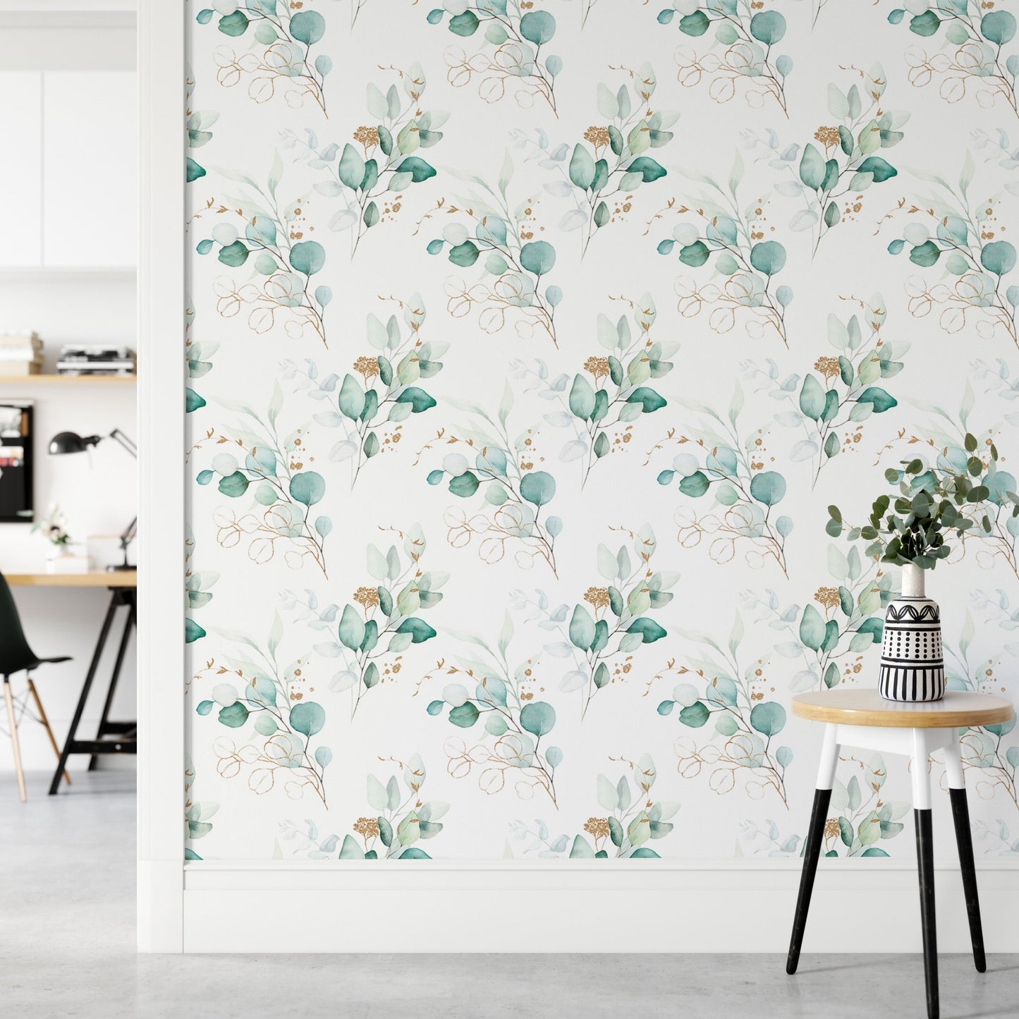 Beautiful watercolor eucalyptus branches green wallpaper in a hallway with a side table