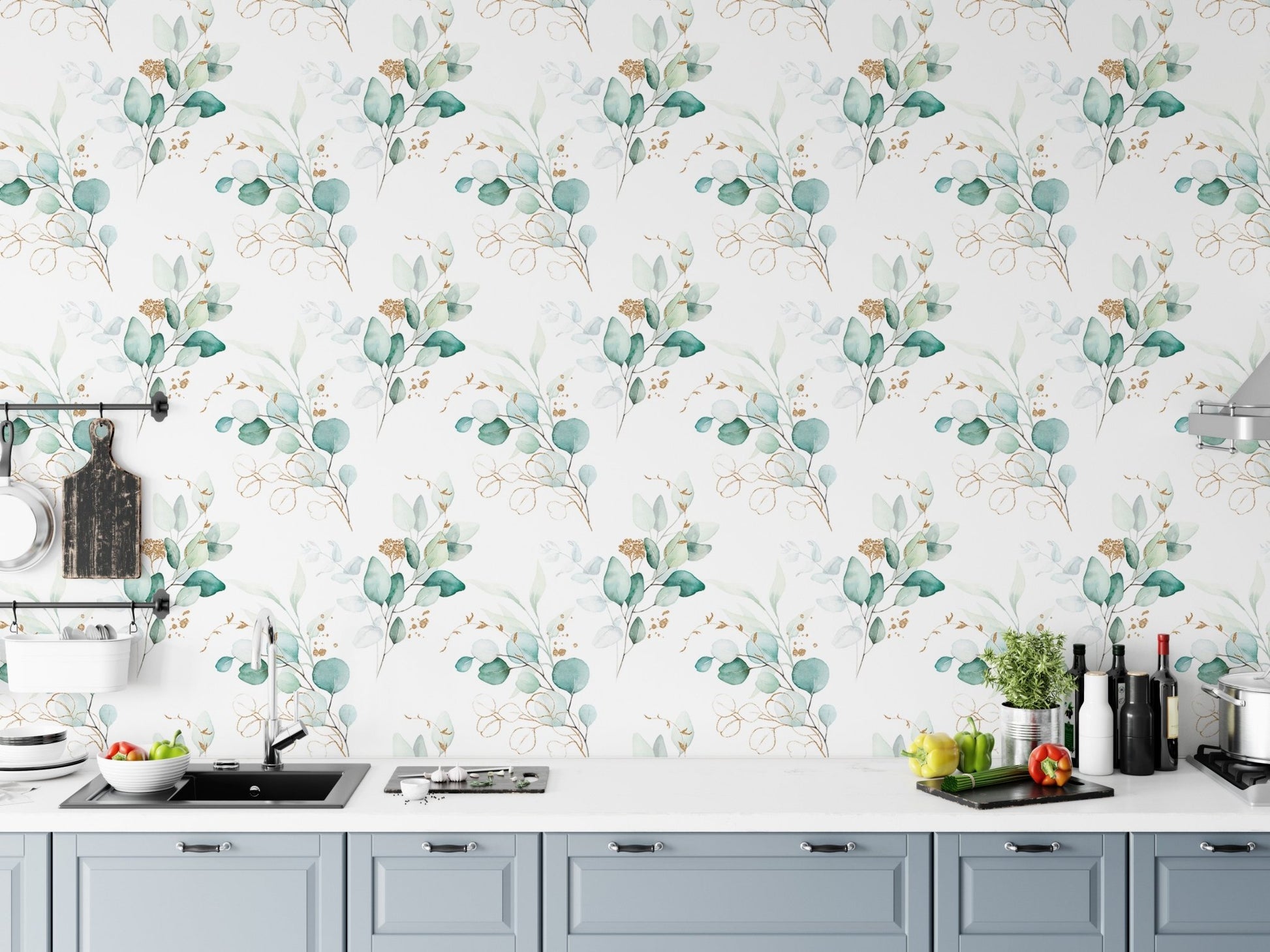 Botanical green wallpaper in a kitchen setting above a white countertop