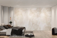 Light beige textured geometric mural with soft watercolor style shapes.