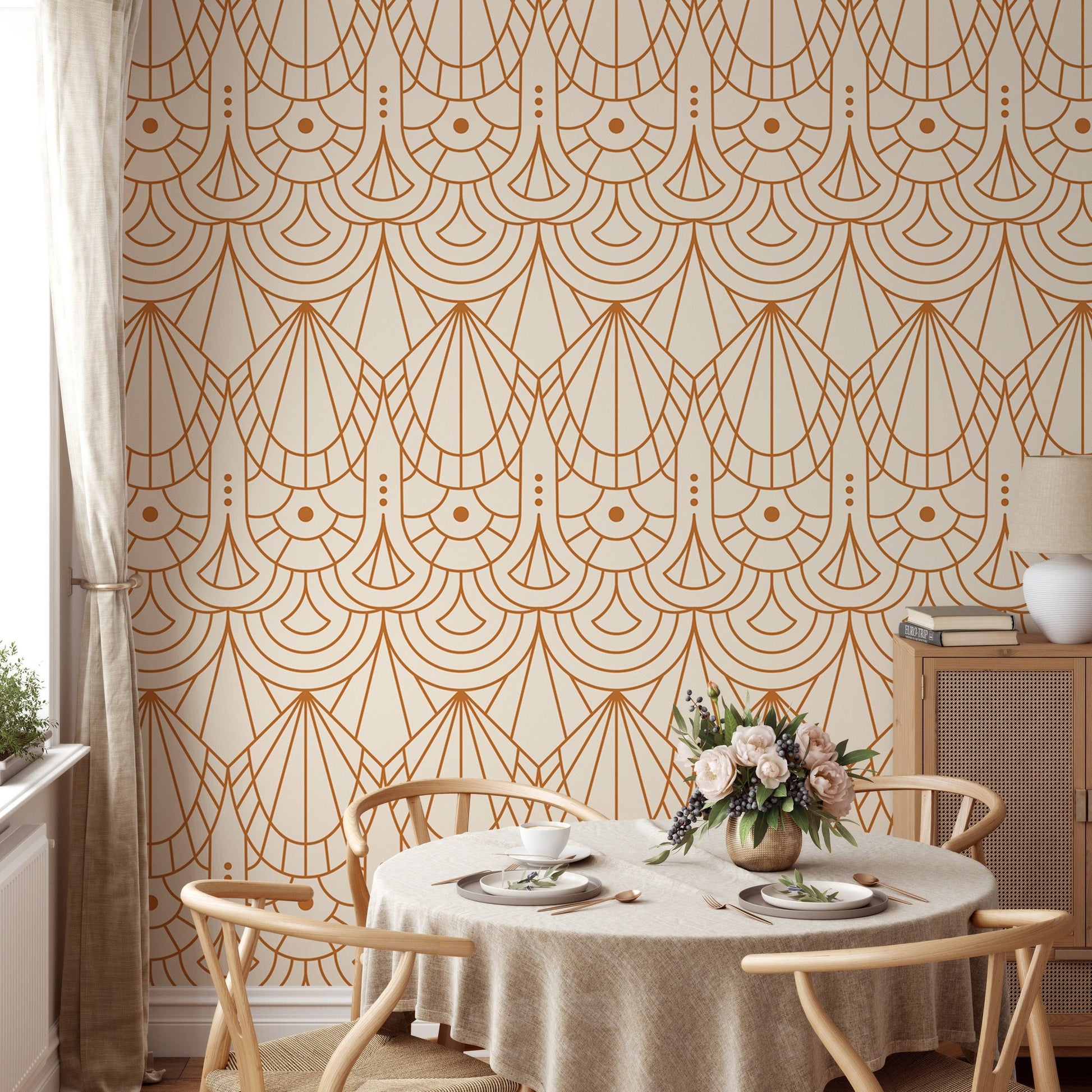 Art Deco wallpaper in a bright dining room with a round table and chairs.