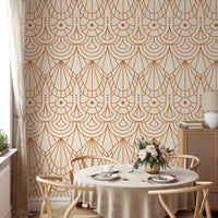 Art Deco wallpaper in a bright dining room with a round table and chairs.