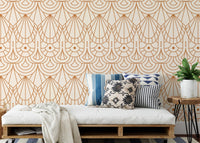 Beige and orange Art Deco repeat pattern wallpaper in a modern living room setting.