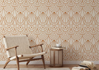 Beige and orange geometric wallpaper in a minimalist room with a wooden armchair.
