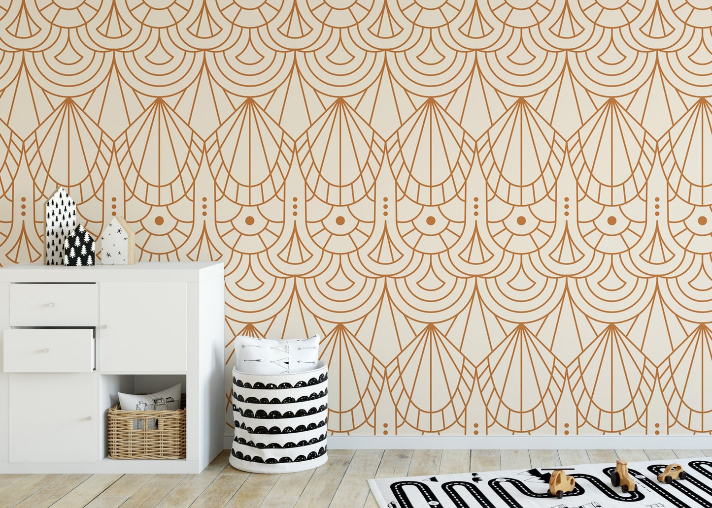 Art Deco pattern wallpaper behind a white cabinet and organized storage bins.