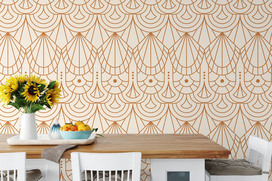 Art Deco repeat pattern wallpaper styled behind a white dining table and sunflowers.