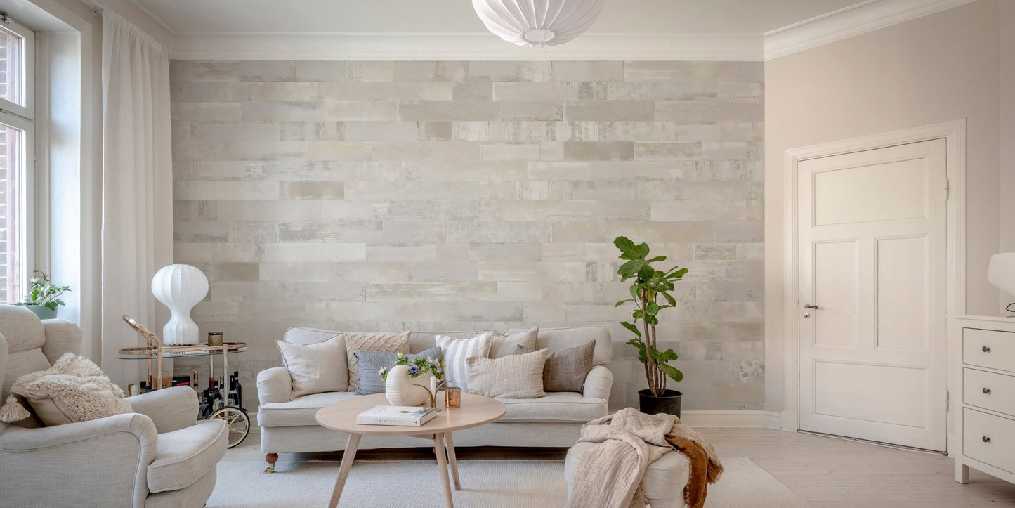 Realistic brickwork wall mural in a living room with a beige sofa.