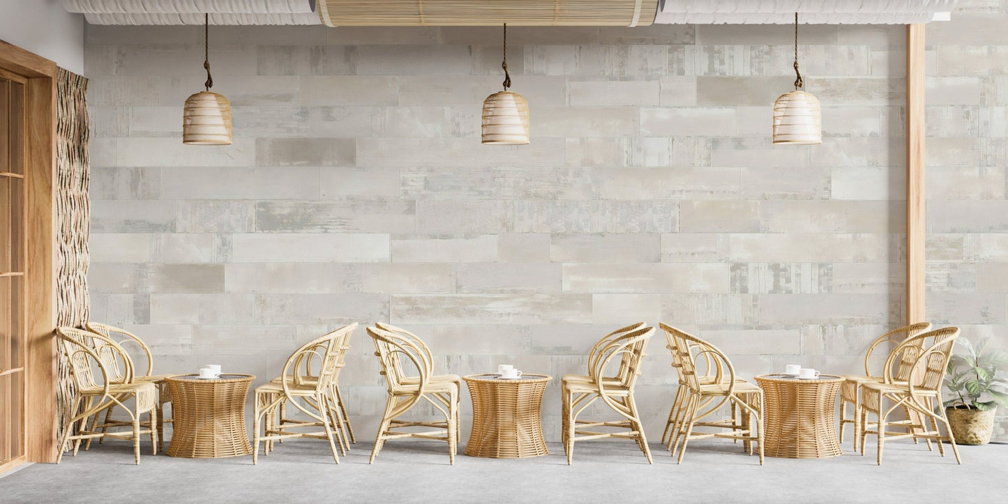 Rustic brick-inspired wall mural in cafe with tables and chairs.