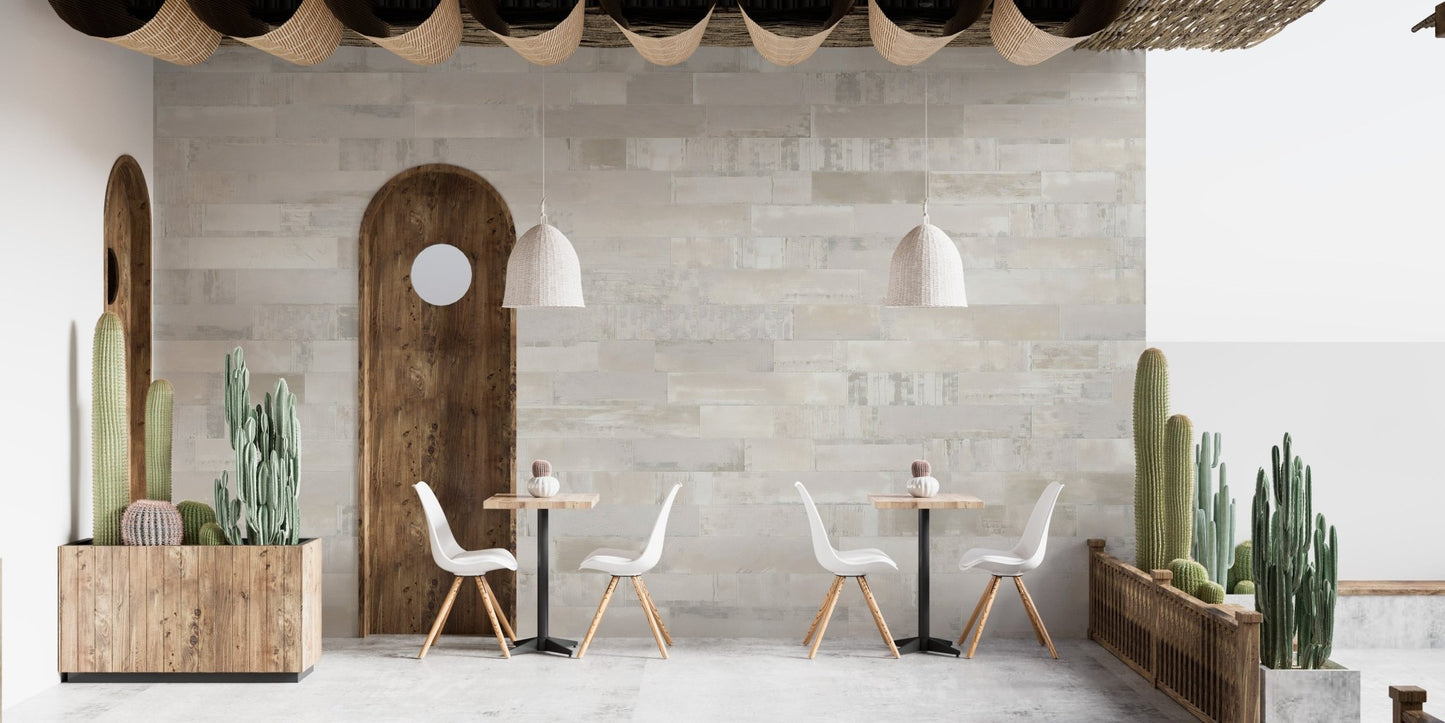 Faux brick wall mural in an outdoor-style lounge with woven lighting.