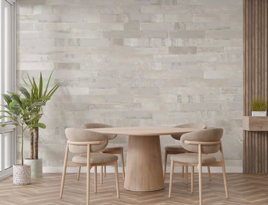 Realistic beige brick textured wall mural in a dining room.