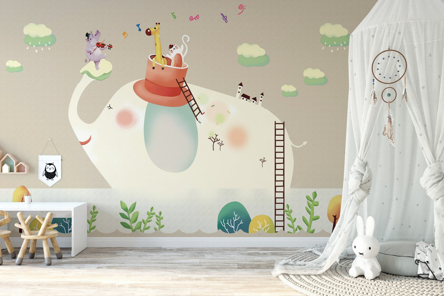 Nursery wall mural showing a large elephant with a red hat and birds.