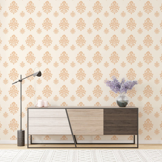 Beige classical damask repeat pattern wallpaper on a wall behind a wooden sideboard.