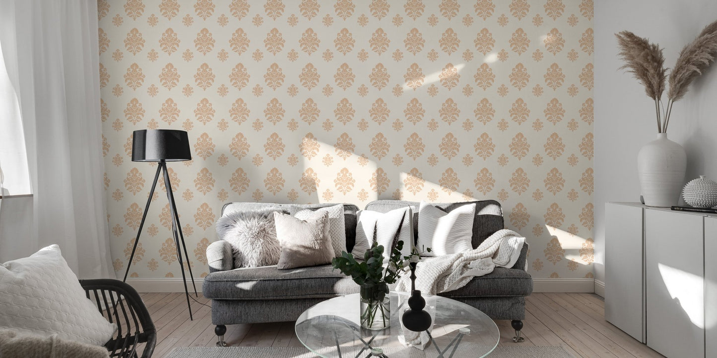 Neutral damask wallpaper in a sunlit room with a grey sofa and floor lamp.