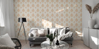 Neutral damask wallpaper in a sunlit room with a grey sofa and floor lamp.