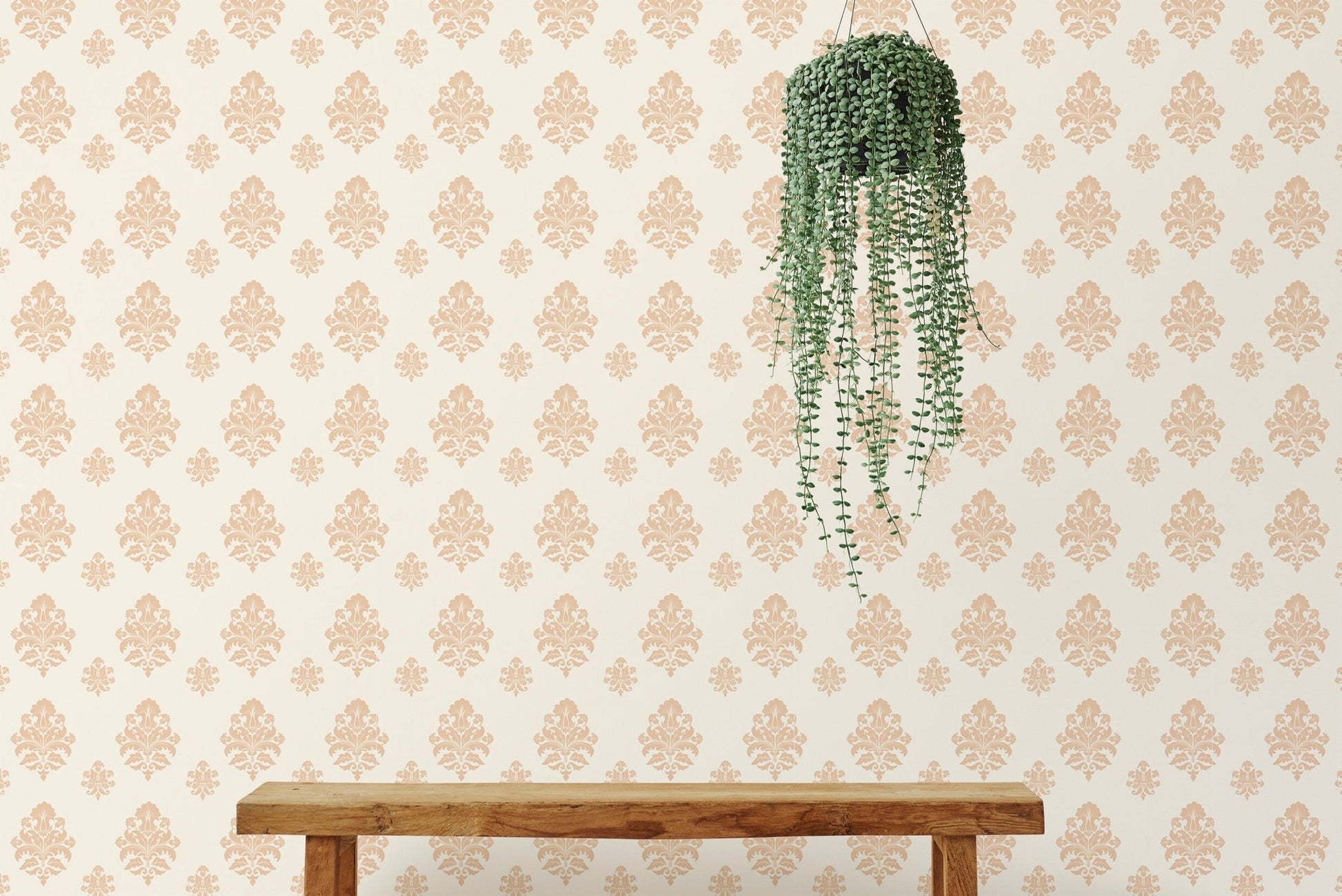 Minimalist wallpaper featuring a beige damask pattern and a hanging green plant.