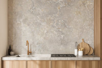 Marble effect wall mural installed behind a wooden kitchen countertop