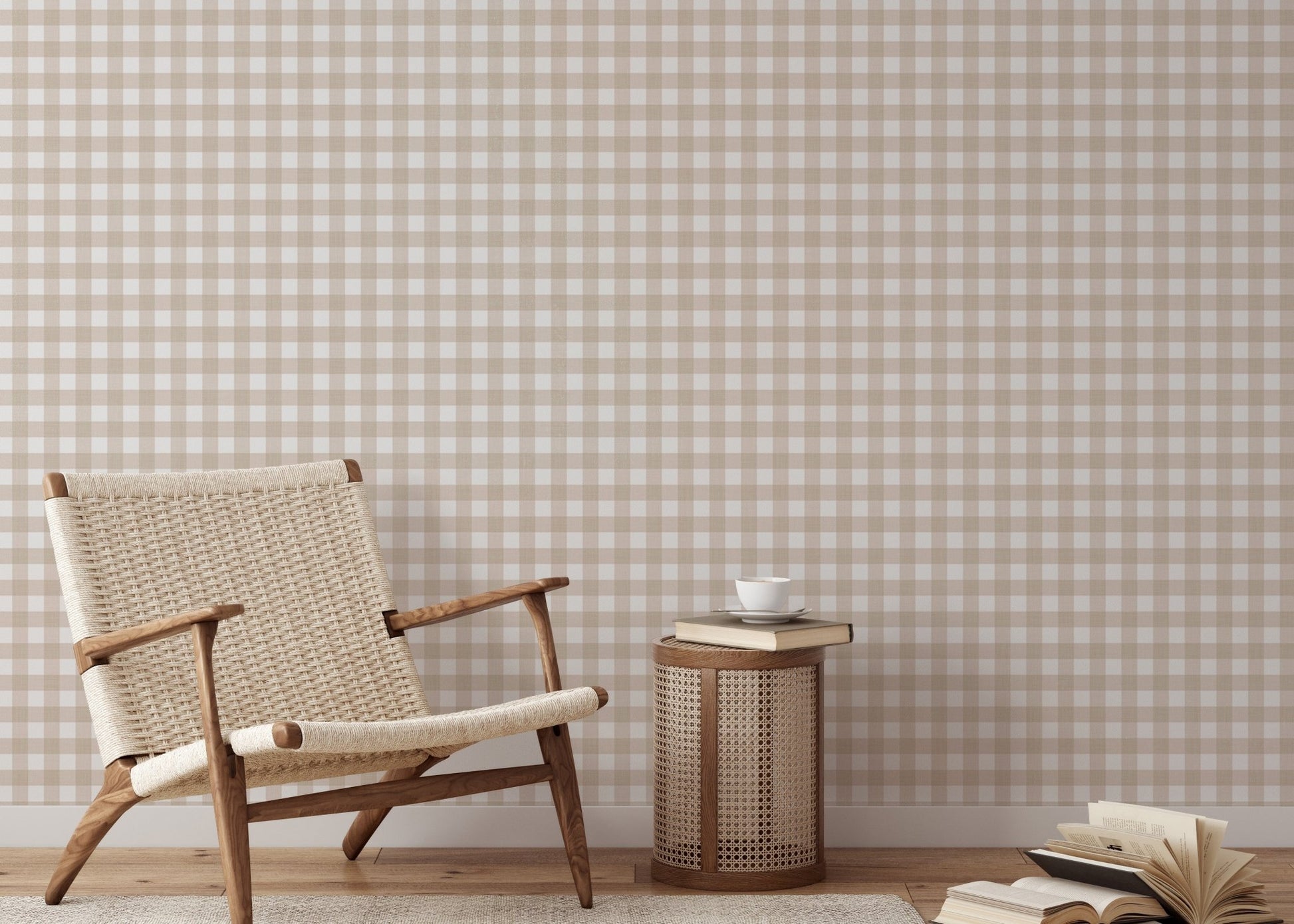 Reading nook with a wicker chair and beige scozzese stripe wallpaper.