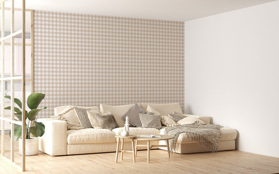 Large lounge with a neutral sofa and beige color scozzese shabby stripe wallpaper.