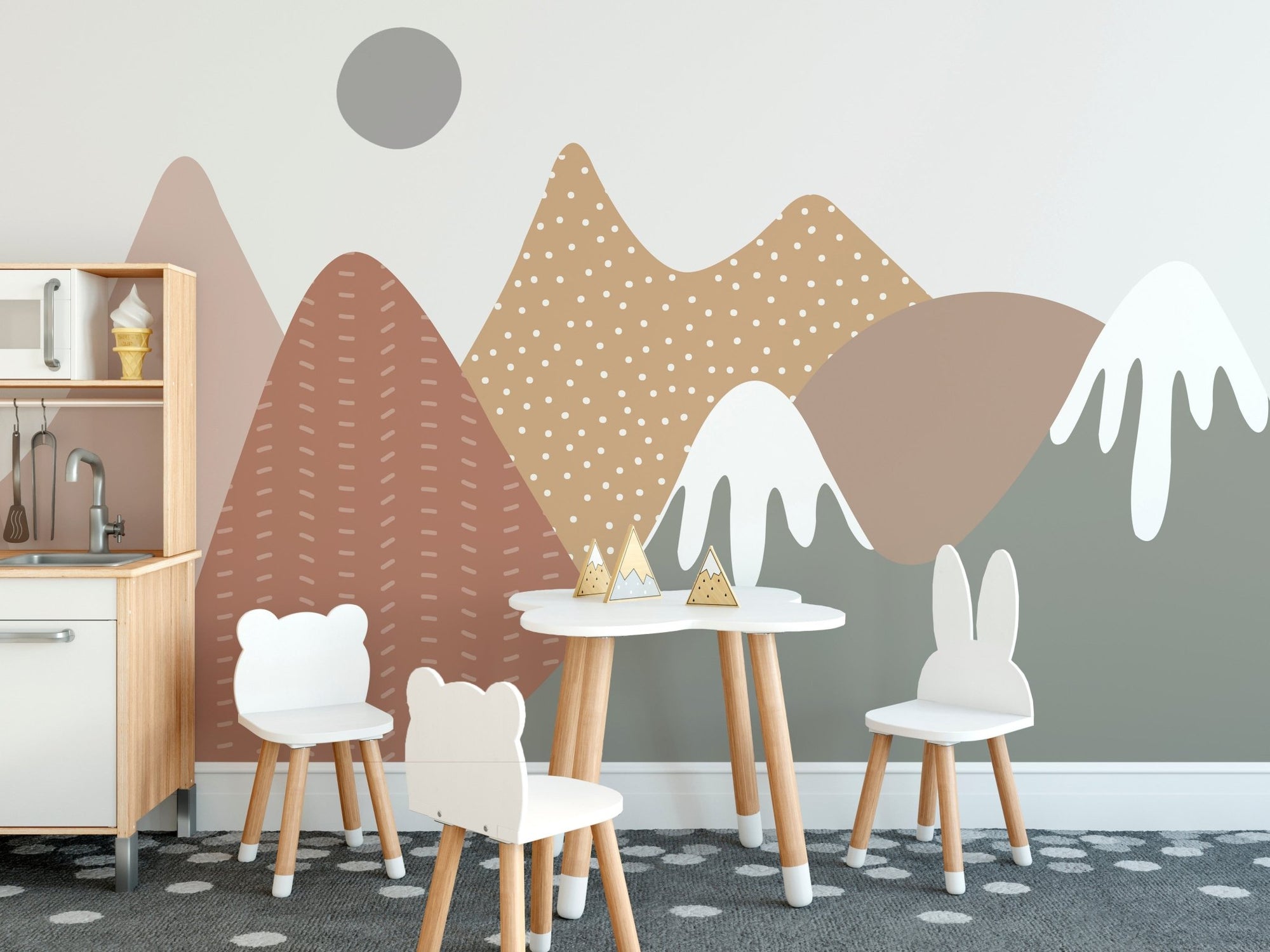 Beige mountain nursery wallpaper with soft terracotta and sage peaks.