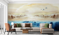 Scenic nature wall mural with cranes flying above cascading water for home office.
