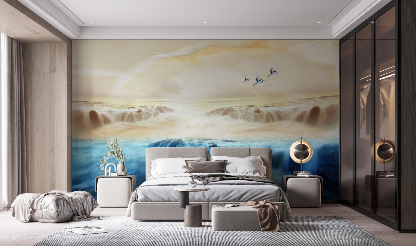 Soft beige sky landscape mural with cranes flying over misty water for bedroom.