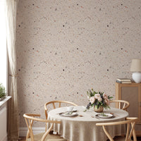 Beige Venetian Quartz Stone Terrazzo Tiles Wallpaper behind round dining table.