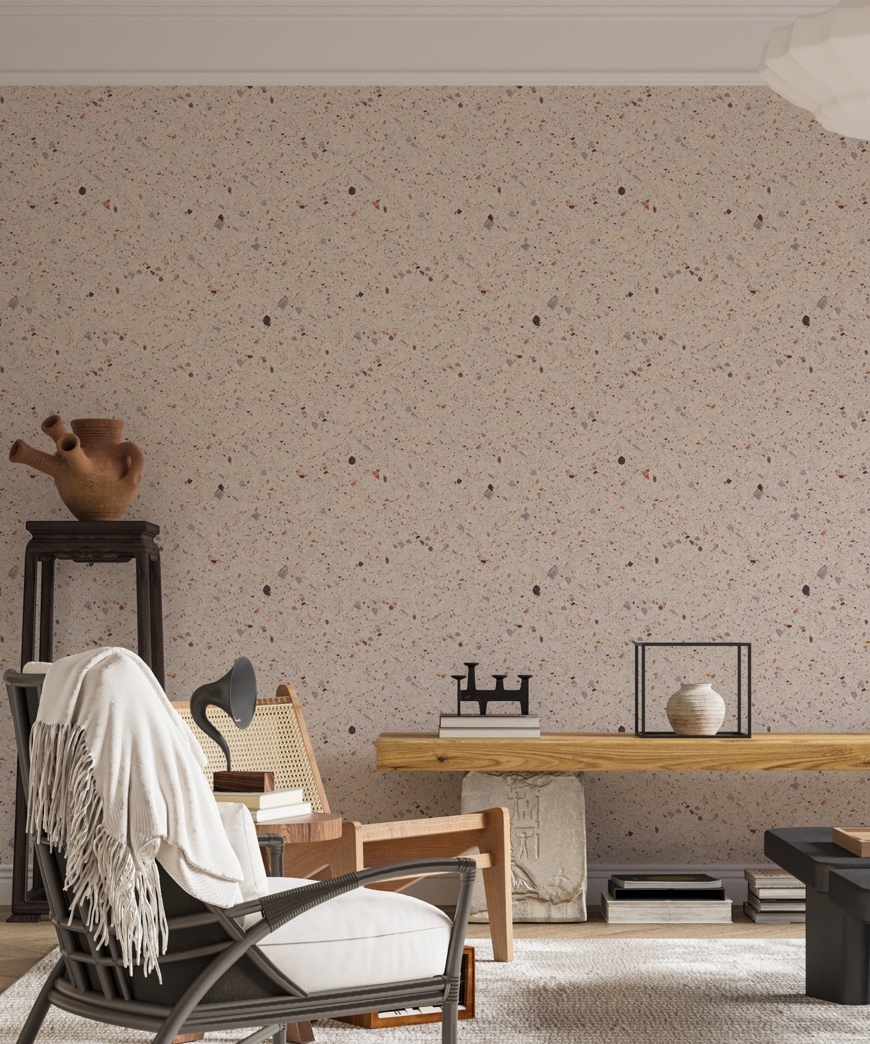 Stone texture wallpaper in living area with black chair and side table.