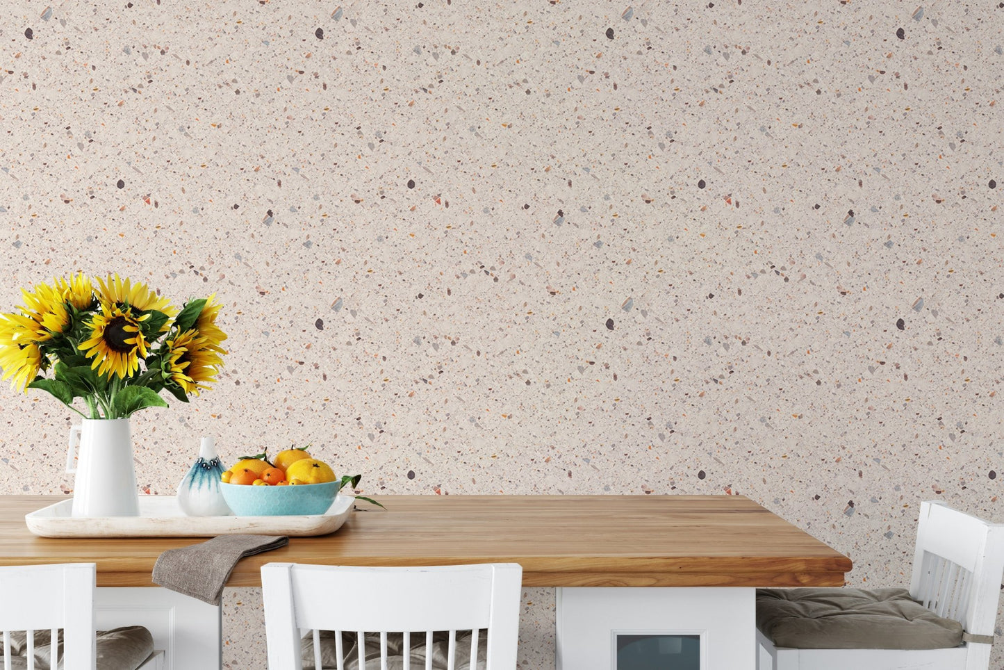 Dining area wallpaper with beige stone and white wooden table.
