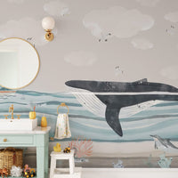 Soft blue and gray ocean scene kids wallpaper for a calm interior aesthetic.