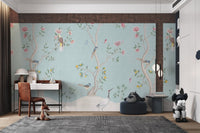 White tree and pink flower wall mural for a light blue study room theme.