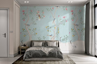 Pink peonies and birds wall mural with a light blue background.