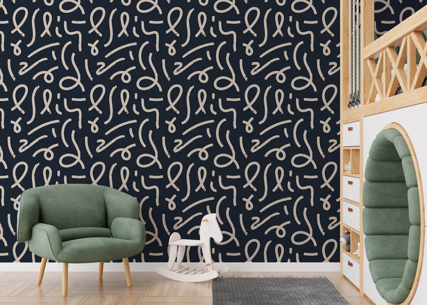 Scribble pattern wallpaper in a kids play area with a green armchair.