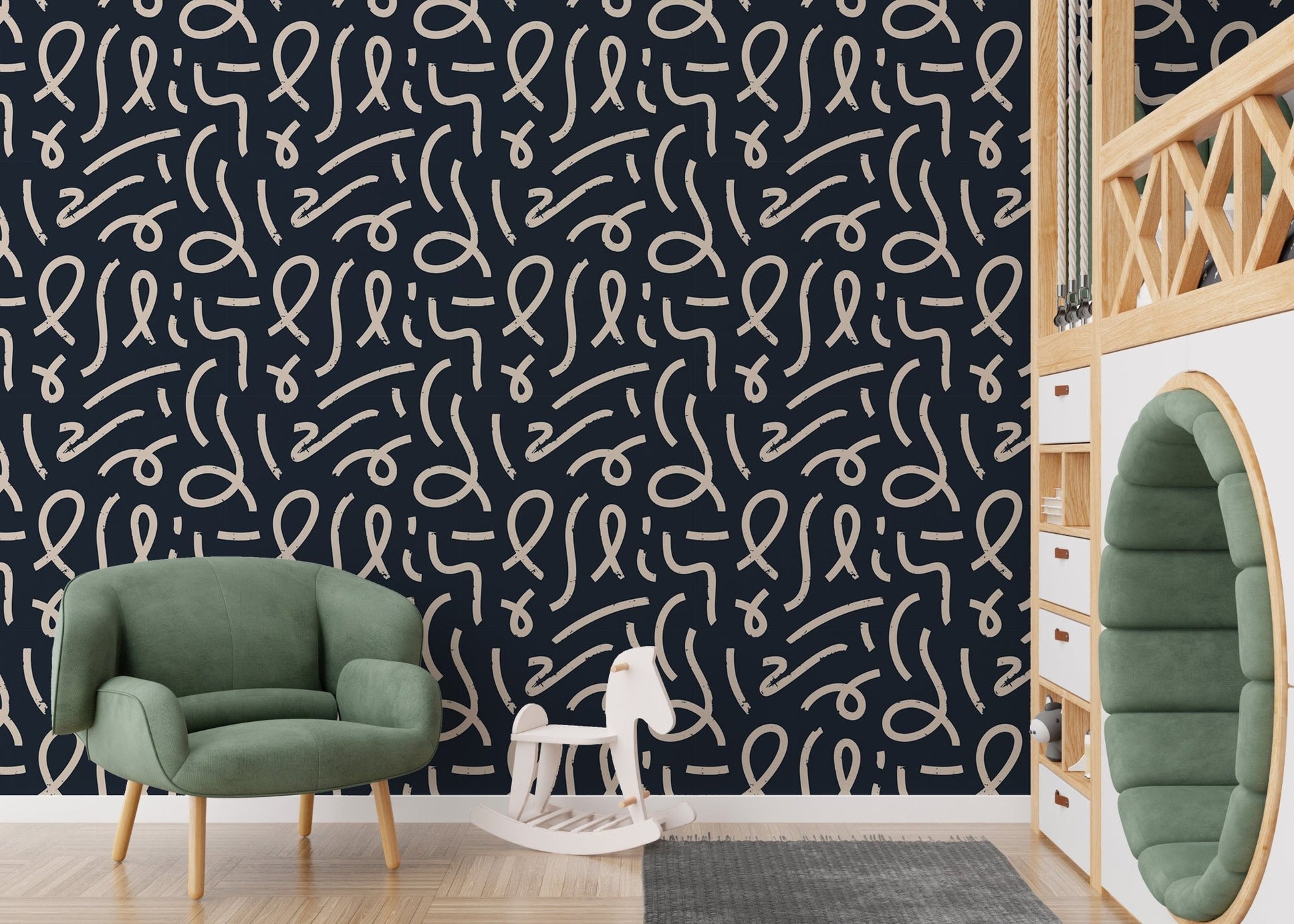 Scribble pattern wallpaper in a kids play area with a green armchair.