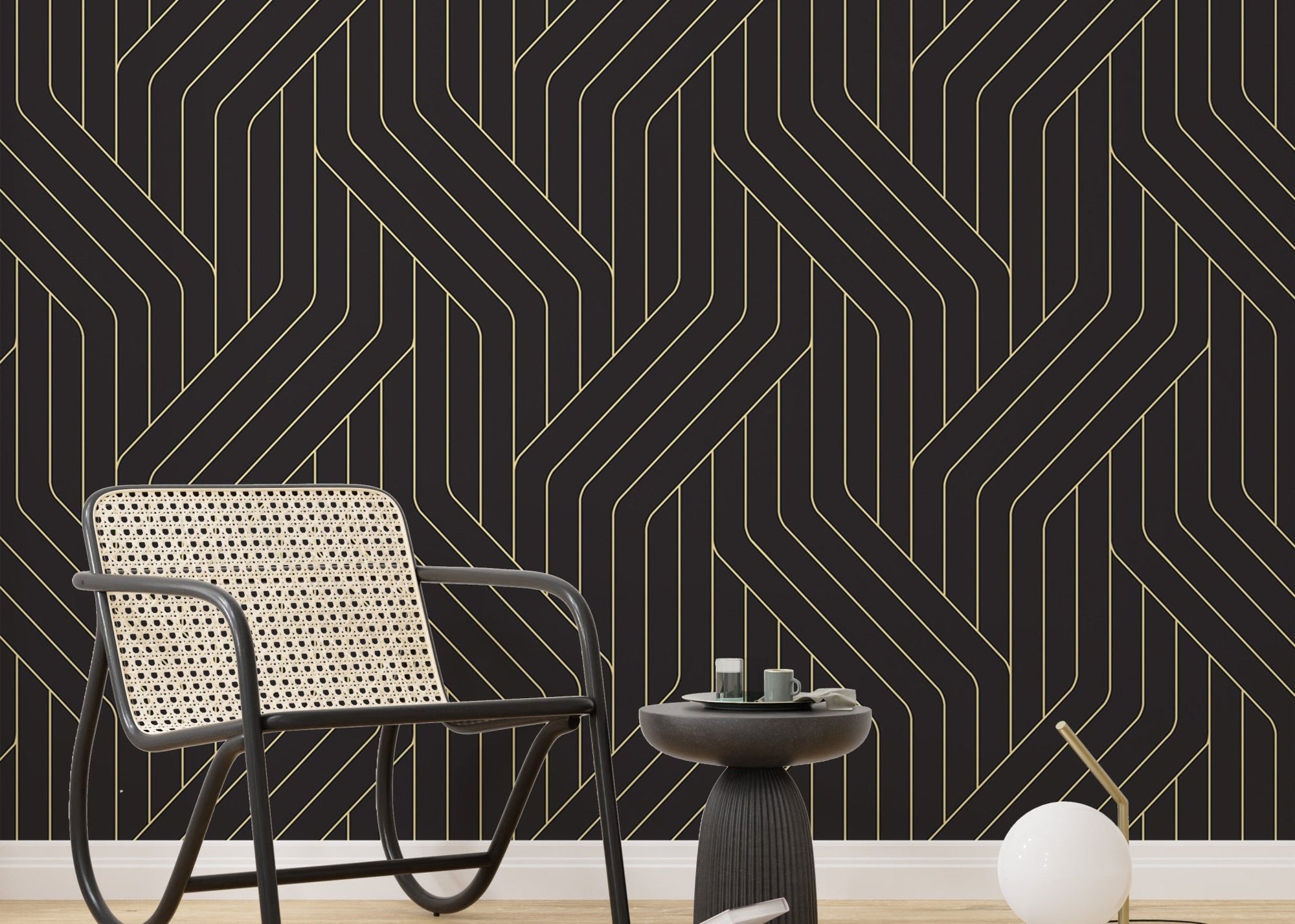 Ornate black and gold rounded line wallpaper in sitting area.