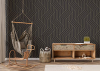 Gold and black ornate wallpaper with lines in nursery area.