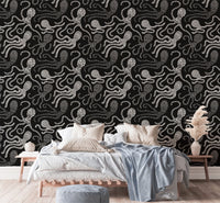 Modern bedroom wallpaper with an octopus pattern behind a wooden bed frame