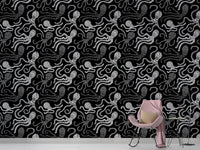 Scandinavian-style wallpaper featuring octopus artwork in kids space.