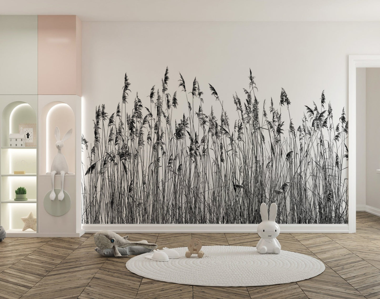 Monochrome reed canebrake wall mural behind a white crib in a modern nursery.