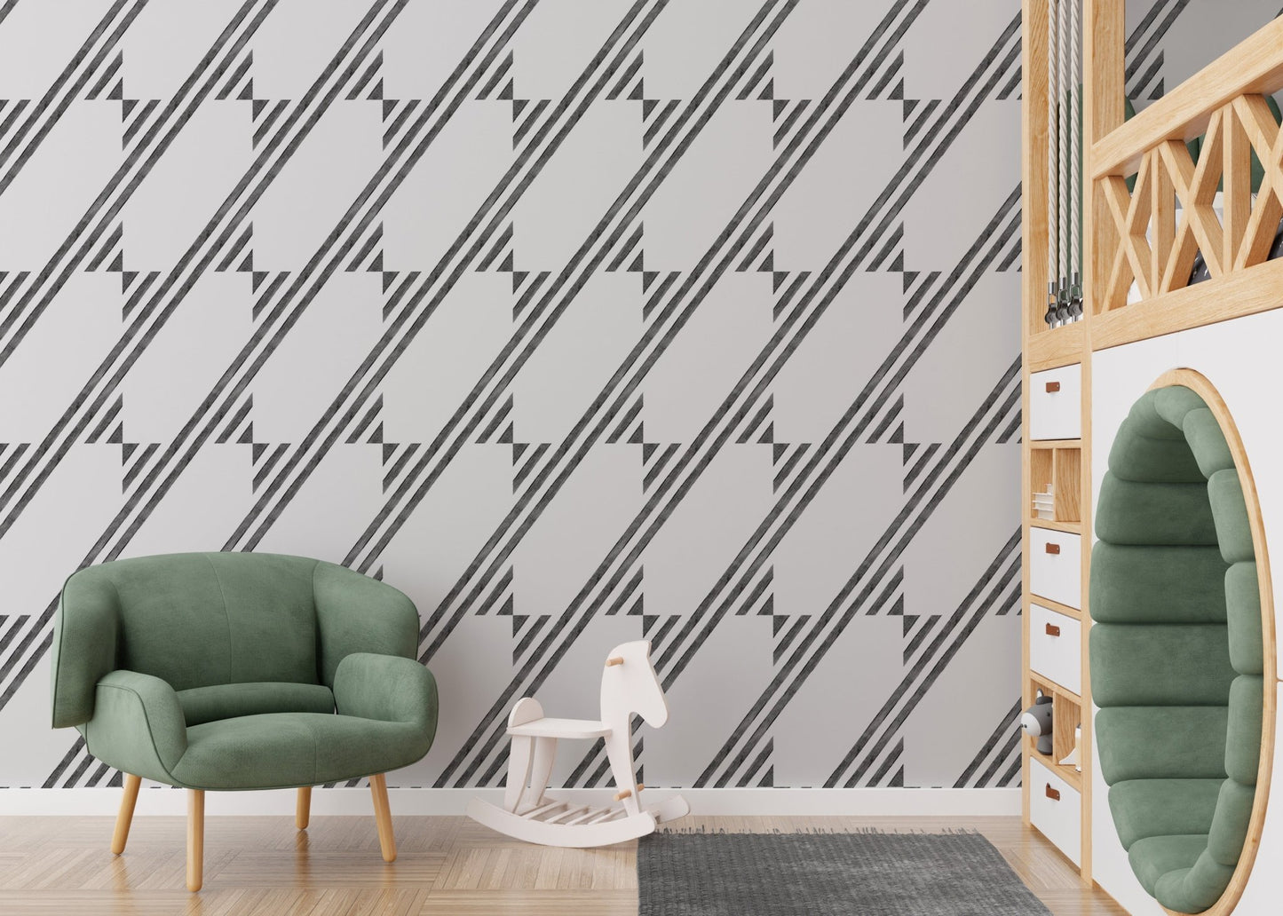 Playroom area with a green chair and monochrome diagonal stripe wallpaper.