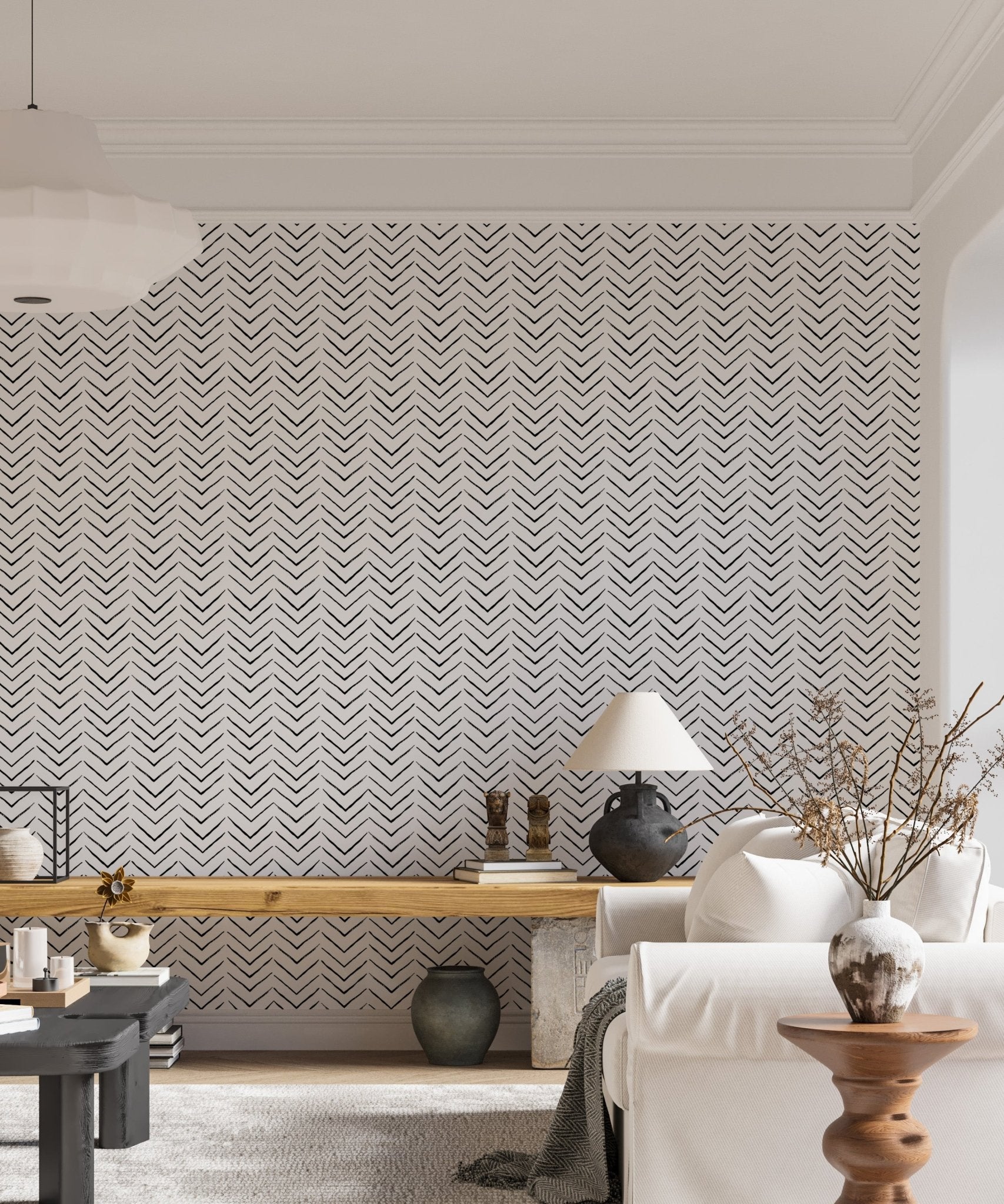 Black and white ethnic geometric Scandinavian wallpaper in a modern living room.