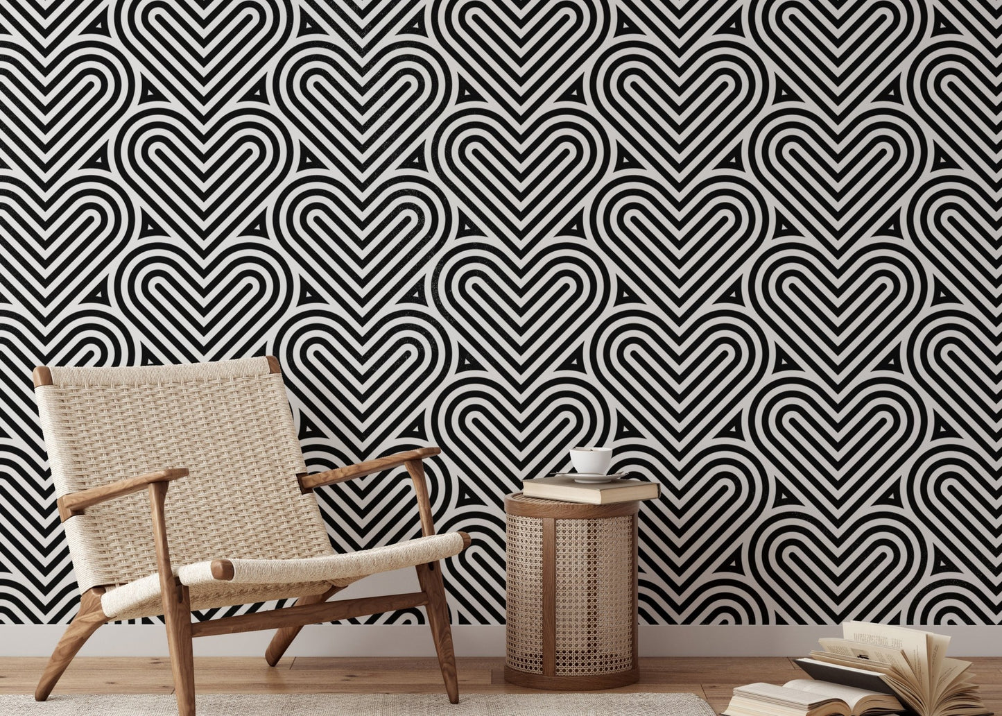 Black and white heart wallpaper in a reading area with a beige armchair.