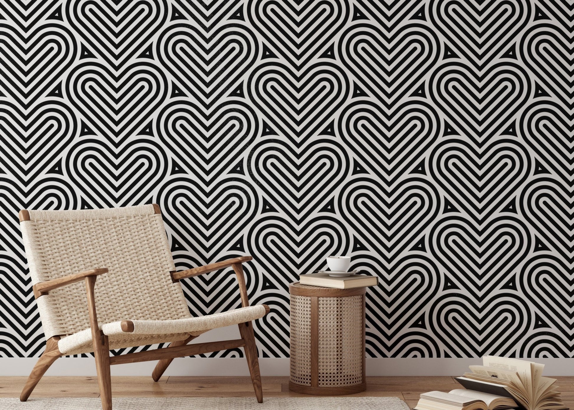 Black and white heart wallpaper in a reading area with a beige armchair.