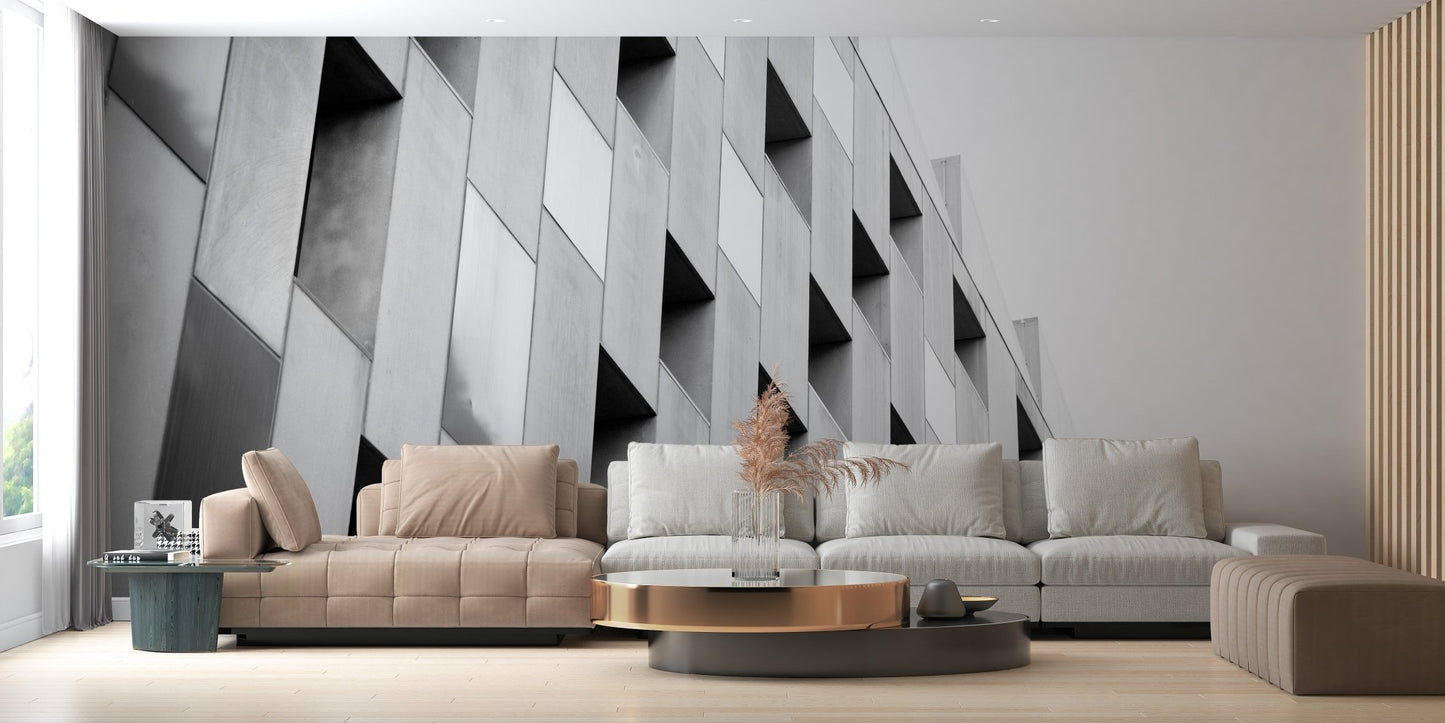 Contemporary sitting area with black and white wall mural and soft neutral lighting.